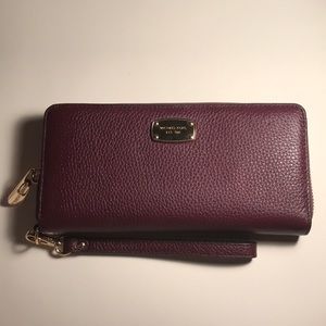 Michael Kors woman’s wallet.